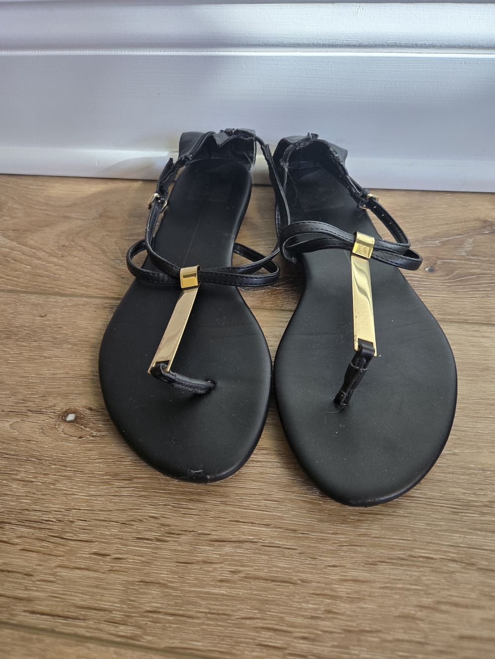 Dolce Vita Black T-Strap Sandals with Gold Bar